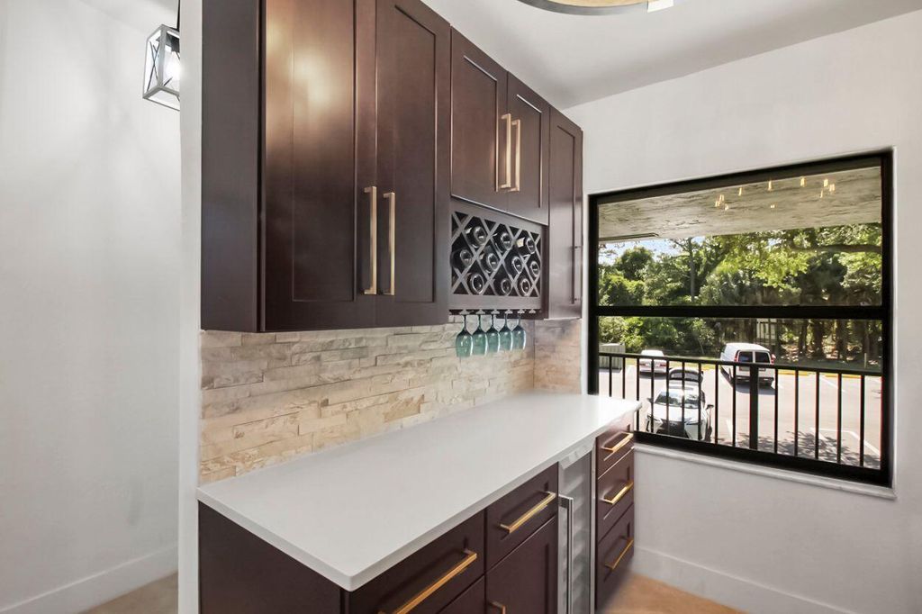 Photo of 1001 Sabal Ridge Circle #F, Palm Beach Gardens, FL 33418 (MLS # R10990714)