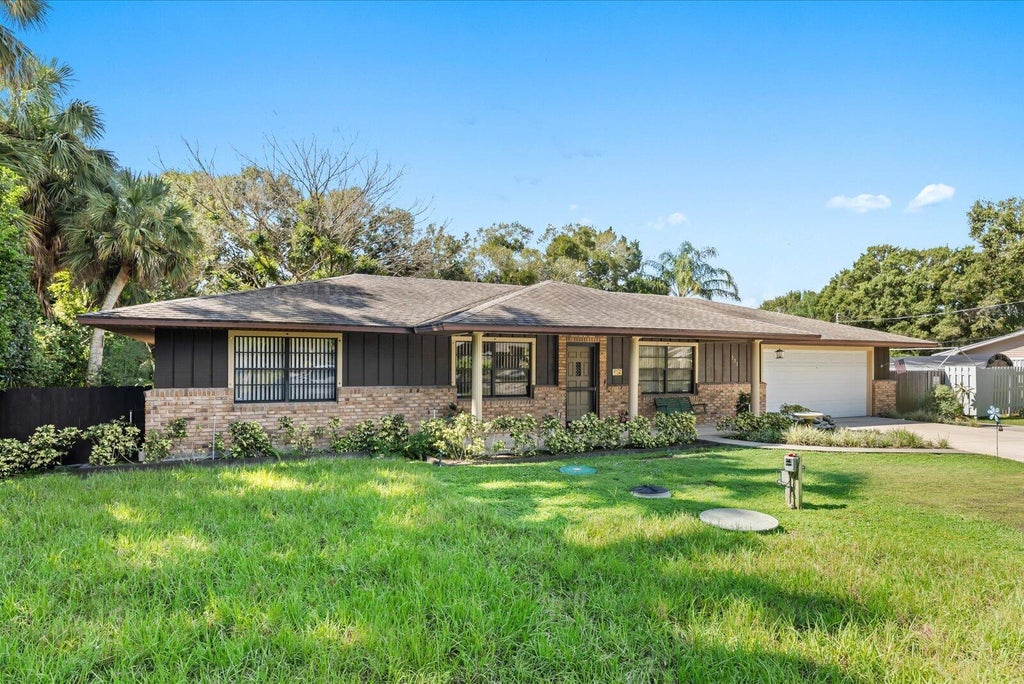 Photo of 351 BAYSINGER Avenue, Fort Pierce, FL 34982 (MLS # B26075289)