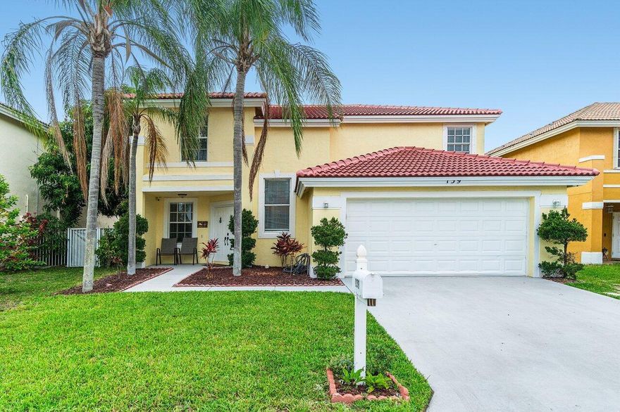 Lakefront gem in gated Boynton Estates! HOA under $140/month. Situated on one of the largest lots in the community with stunning lake views and refreshing lake breeze from your back patio. This move-in-ready home features vaulted ceilings, a split floorplan, a