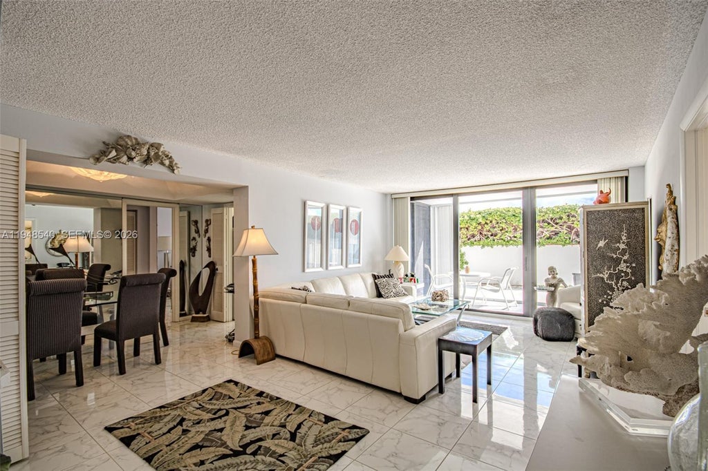 Photo of 3590 S Ocean Boulevard #102, South Palm Beach, FL 33480 (MLS # A11948540)