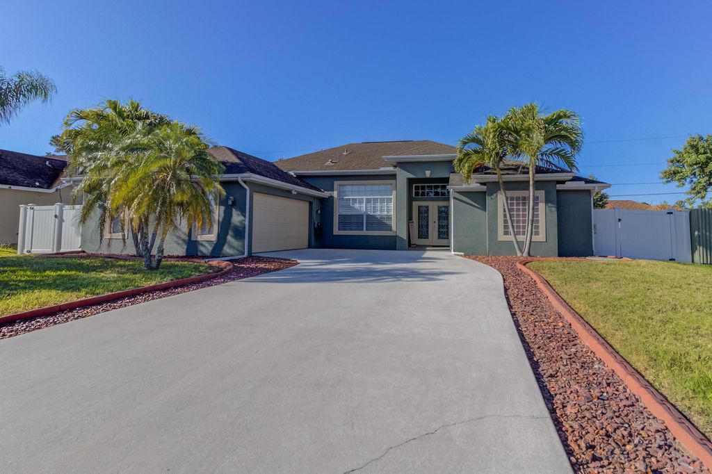 Photo of 942 SW Consolata Avenue, Port Saint Lucie, FL 34953 (MLS # R11086674)
