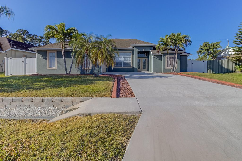 Photo of 942 SW Consolata Avenue, Port Saint Lucie, FL 34953 (MLS # R11086674)
