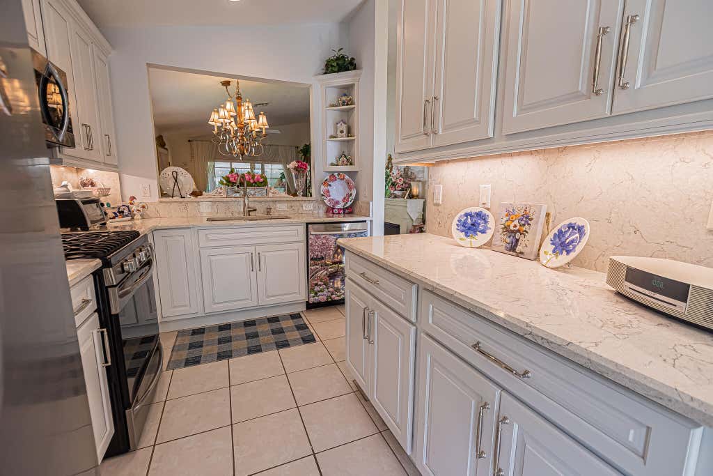 Photo of 627 NW Whitfield Way, Port Saint Lucie, FL 34986 (MLS # B26055354)