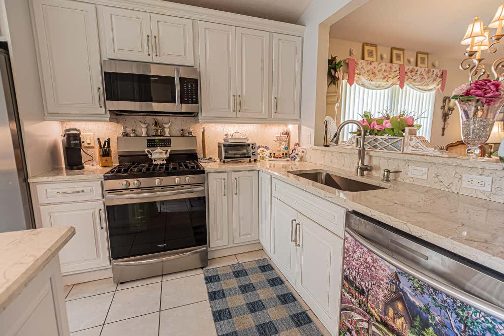 Photo of 627 NW Whitfield Way, Port Saint Lucie, FL 34986 (MLS # B26055354)