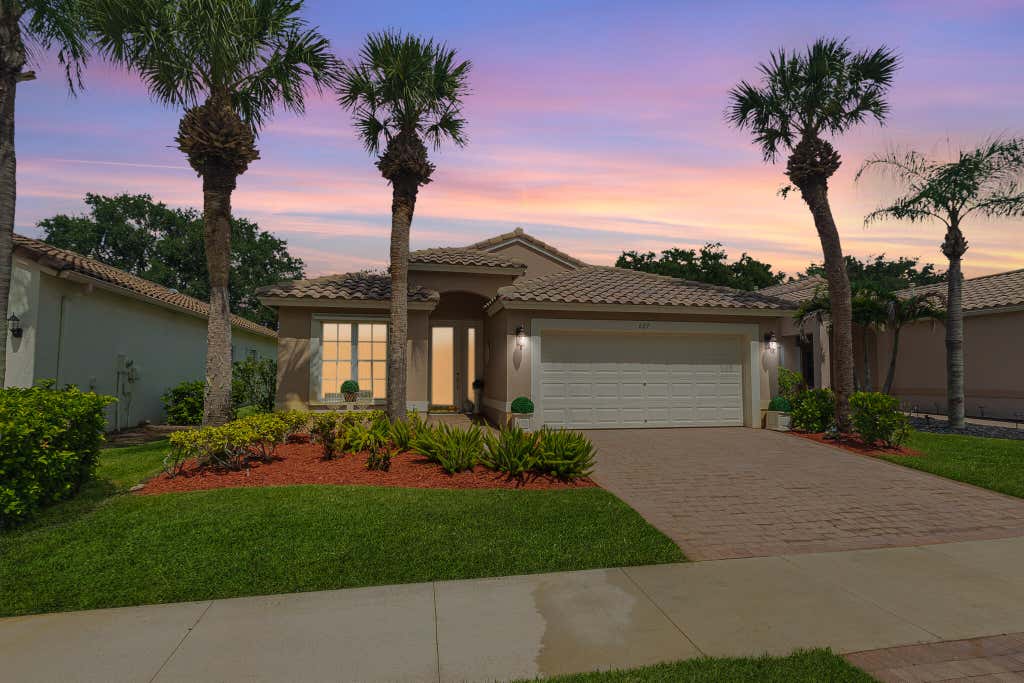 Photo of 627 NW Whitfield Way, Port Saint Lucie, FL 34986 (MLS # B26055354)