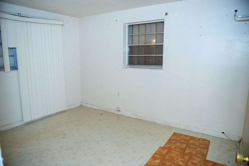 Photo of 401 Janice Avenue, South Bay, FL 33493 (MLS # R10903263)