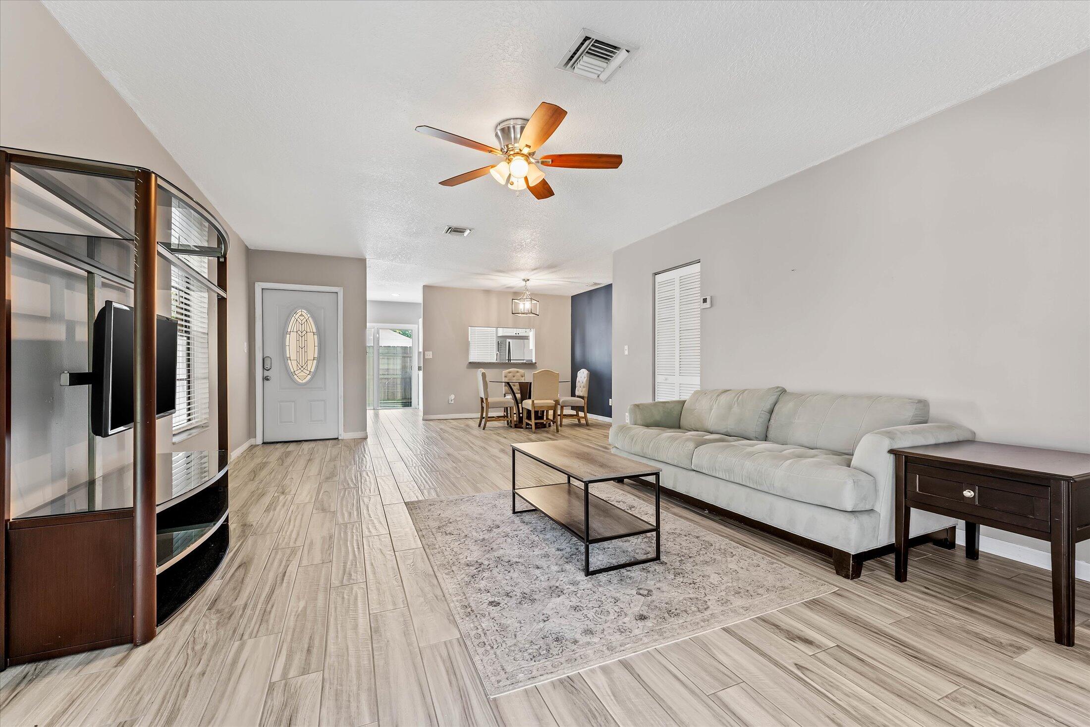 Welcome to this beautifully remodeled villa. Tile wood finish floors give this place a great upscale finish. White and stainless in the kitchen give it a very clean feel. Washer/Dryer in unit for ease of living. Parking is right in front of the home. Plenty of backyard for kids or pets. 1200sqft under air really allows you to have full size kitchen, dining and living space and still have a breakfast nook or office space. New roof, new water heater, Ac is only a couple years old. 2 minutes from 95, 10 minutes to the public beach, and 10 minutes to Downtown Delray Beach. Shopping dining and everything you need for a weekend of fun.