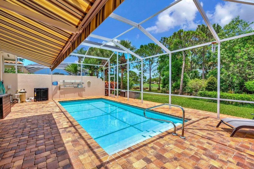 Come See the Beautiful and Meticulous Home.
 New Roof 2021 Impact Windows and Sliders 2022 Swimming Pool with a Screened in Cage. Pavers throughout the property, remodeled Kitchen, OX garage floors, Solar system for the Pool. Tile and Wood Floors through out.Plantation Shutters throughout.