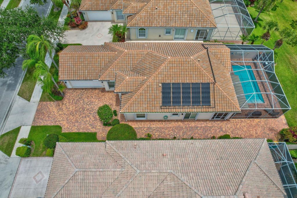 Photo of 8049 SE Paurotis Lane, Hobe Sound, FL 33455 (MLS # R10993177)