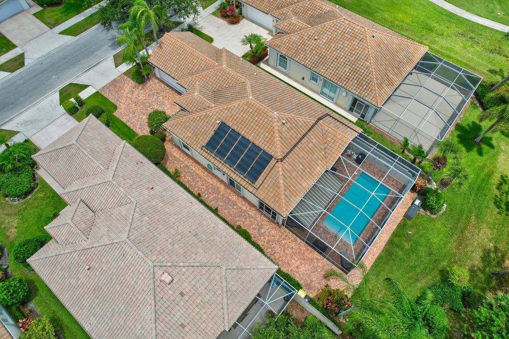 Photo of 8049 SE Paurotis Lane, Hobe Sound, FL 33455 (MLS # R10993177)