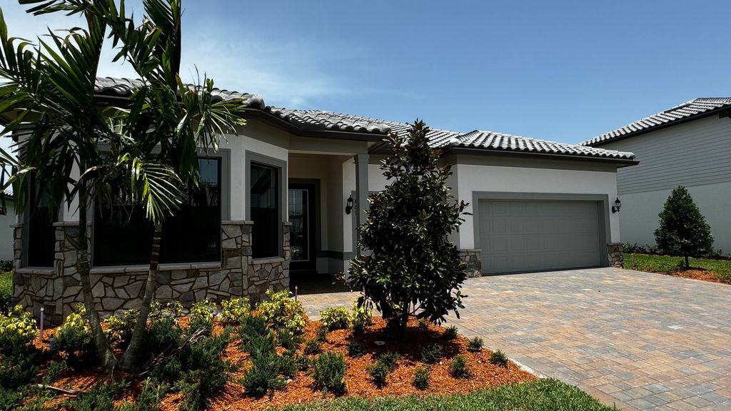Photo of 869 SE Courances Drive, Port Saint Lucie, FL 34984 (MLS # R11001960)