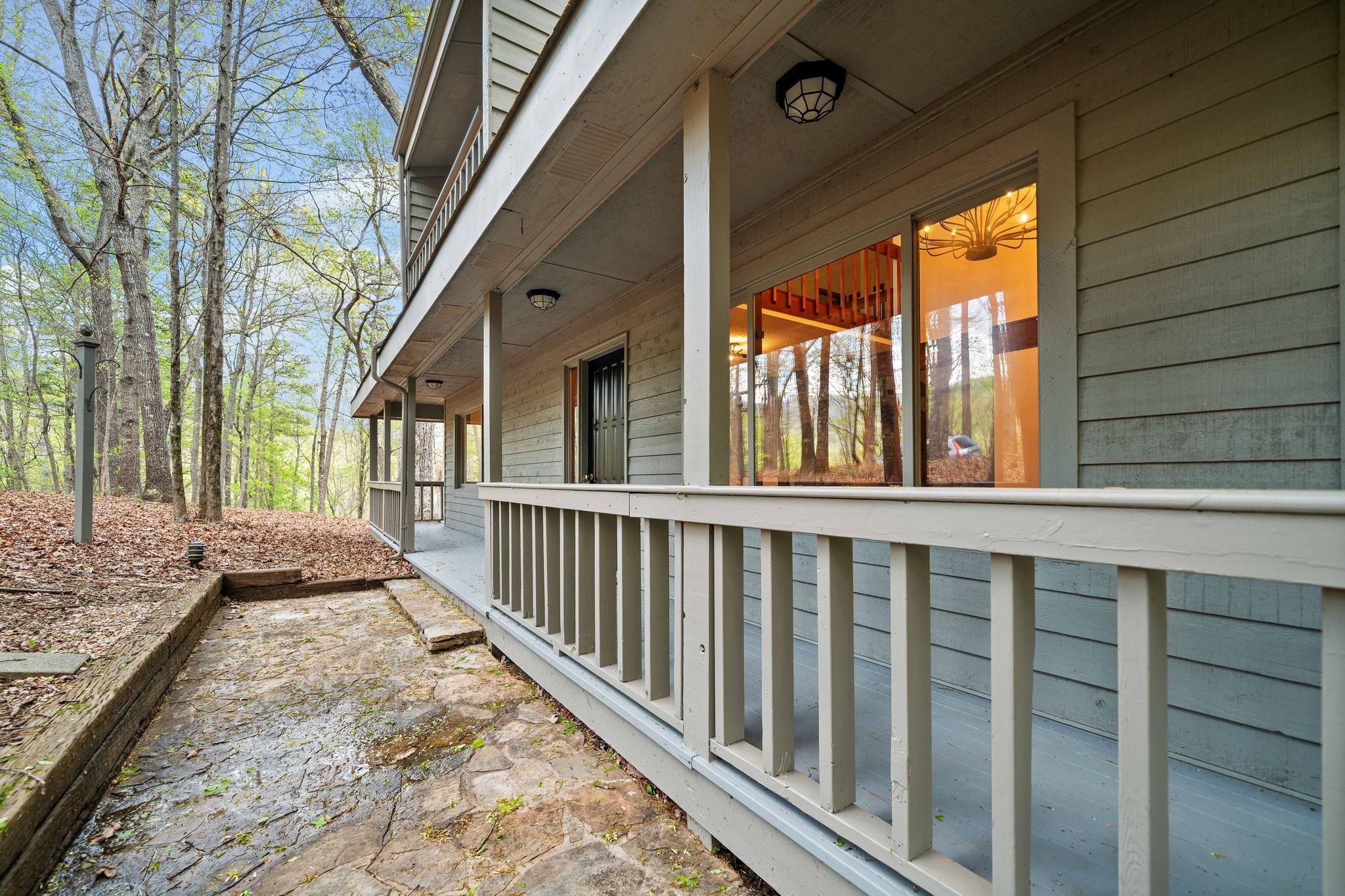 Welcome to this updated 4BR/3BA home in Big Canoe, a gated mountain community just one hour from Atlanta. Situated on 0.91 acres with 2,541 sq ft, it features fresh paint, new HVAC, carpet, flooring, granite countertops, stainless steel appliances, hardwood floors, and double vanities. Two bedrooms have walk-in closets, and large picture windows bring in natural light. The main floor offers a master suite. Each of the three levels has a living room and a bathroom, ideal for families or guests. Flat driveway fits multiple cars. STR allowed! Enjoy wraparound and screened porches. Community amenities: lakes, golf, pools, trails, gym, spa, restaurants & more. Perfect as a mountain getaway, Airbnb, or full-time family home.
