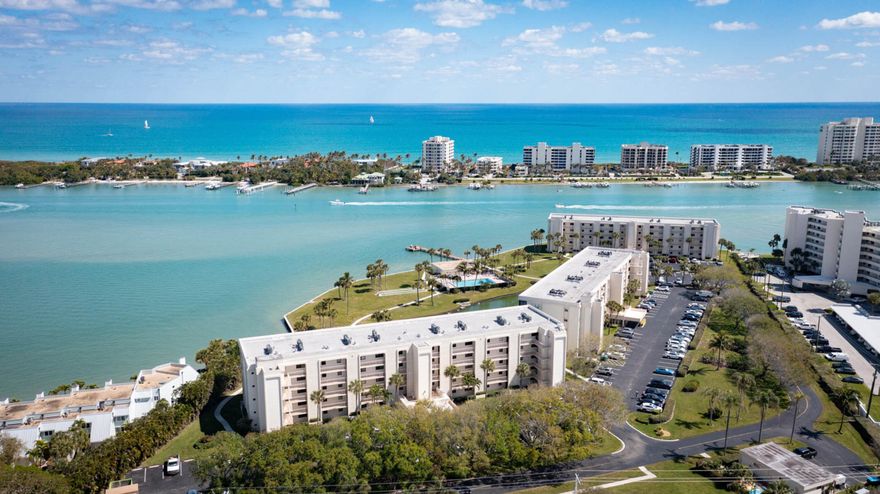 Waterfront 2/2 Condo in excellent condition. 55+ with views of oen Intracoastal and Jupiter Island with peak of the ocean. This unit has hurricane impact windows and sliders. Glass enclosed balcony for extra living space. Walk to stores and restaurants. A MUST SEE !!!