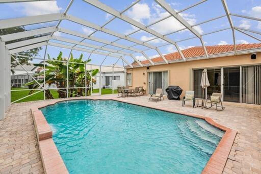 Photo of 7534 Ridgefield Lane, Lake Worth Beach, FL 33467 (MLS # R10896352)