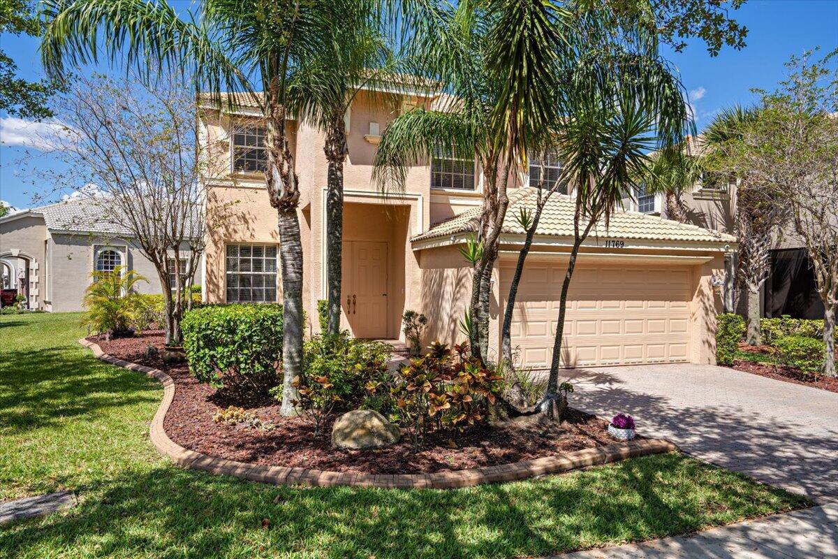 SPOTLESS! Move in ready Berkeley model in family friendly TownPark At Tradition. This 3 bedroom, +den, 2.5 bath home has been lovingly maintained. Perfect for the growing family, or those who need more space. Updated A/C (2021) & Hot Water (2022). Whole home water softener, with under-sink R/O. Eat in kitchen with upgraded granite counters, tile backsplash, breakfast bar & new appliances. Enjoy your morning coffee in fully screened lanai with long lake views. Beautiful main floor with flexible living spaces. Spacious bedrooms upstairs. Primary with den/nursery and walk out to 2nd floor balcony overlooking lake. Only 1 mile away from downtown Tradition. TownPark offers mature park like settings. Full clubhouse with pool/spa, tennis, p-ball, bocce, playground. All new window/door screens.