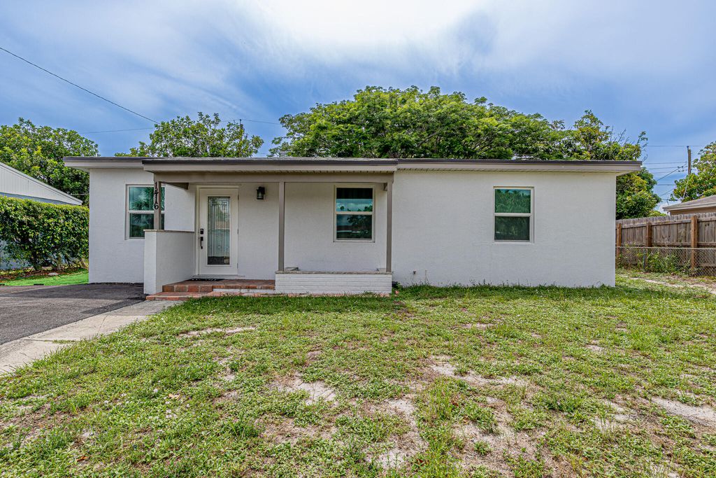 Photo of 1416 S C Street, Lake Worth Beach, FL 33460 (MLS # B26051205)