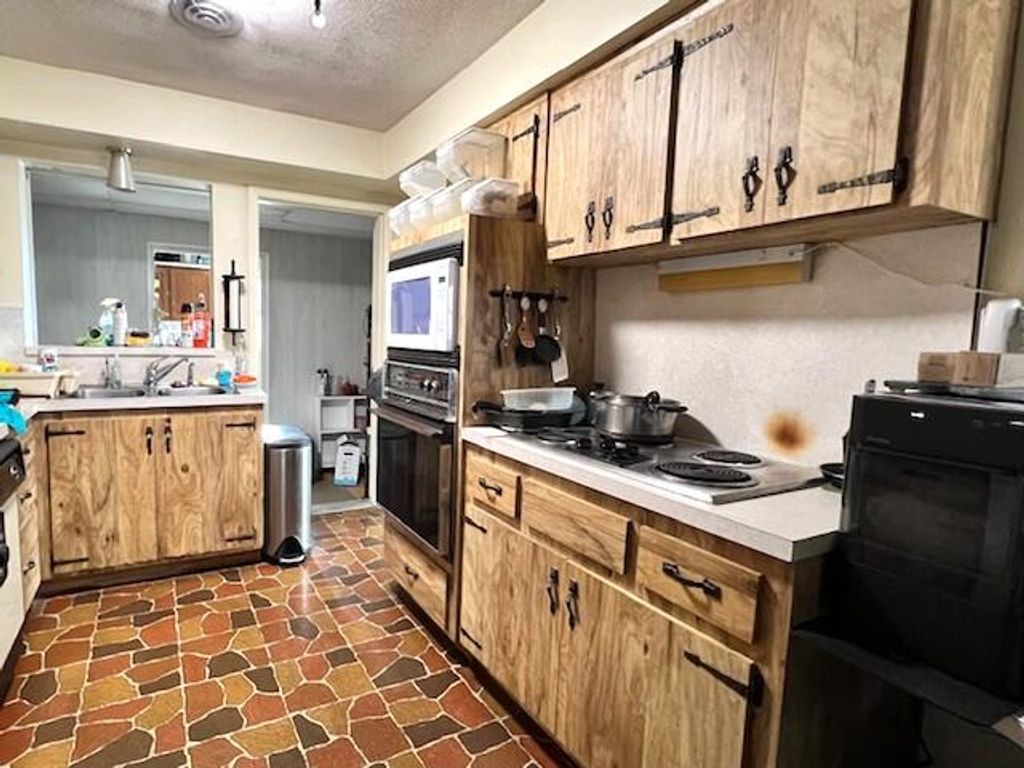 Photo of 725 SE 1st Street, Belle Glade, FL 33430 (MLS # B26005484)