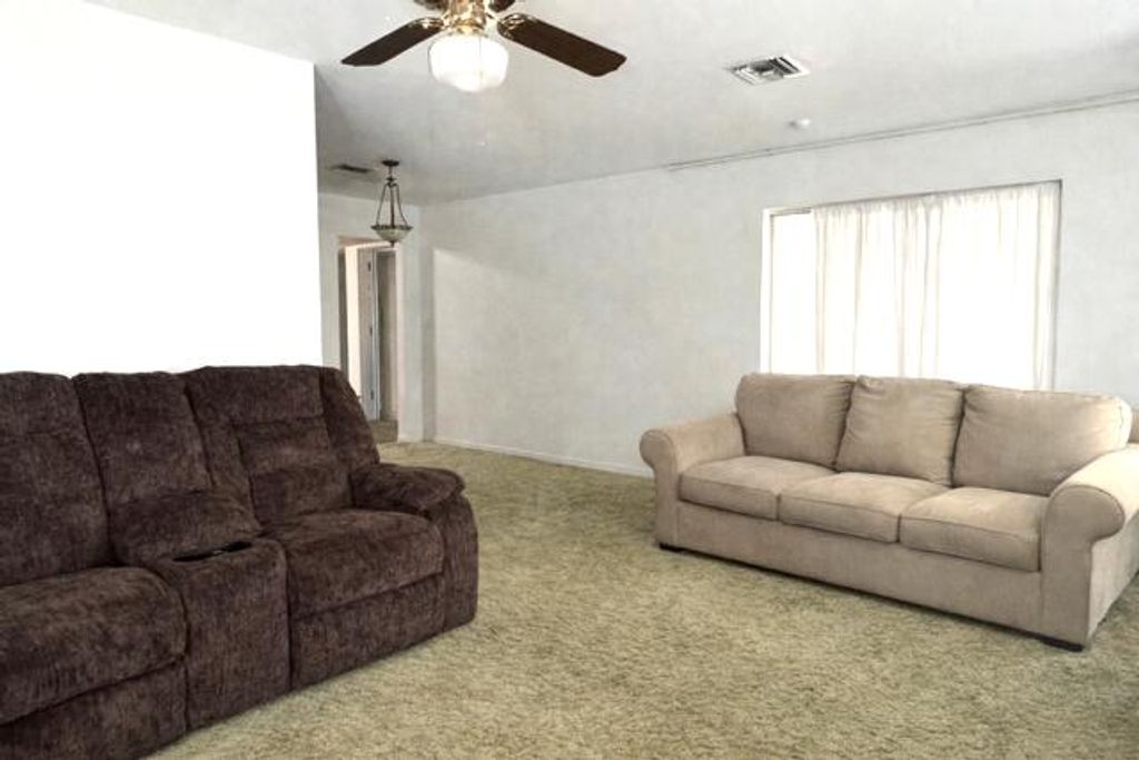 Photo of 725 SE 1st Street, Belle Glade, FL 33430 (MLS # B26005484)