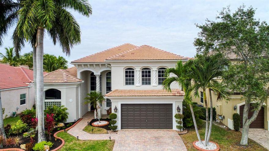 Immaculate updated home with 5 bedrooms and 3 bathrooms. This home has a unique spacious and expansive living feel created by double volume ceilings throughout the entrance and living areas. All bathrooms remodeled elegantly. Awesome paved backyard with beautiful pool and a stunning lake view.  Great location, close to schools and places of worship.