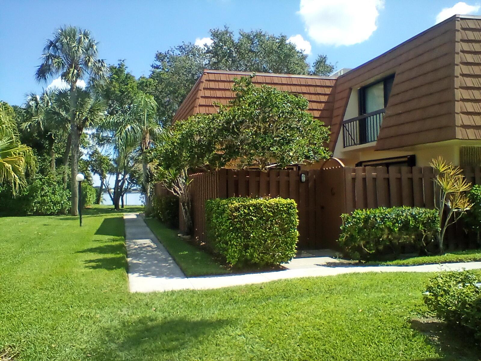 GREAT LOCATION!!!!!! STEP OUT YOUR FRONT GATE, GO AROUND THE CORNER AND THERE WILL BE THE WIDE VIEW OF THE HISTORIC LOXAHATCHEE RIVER. THIS BEAUTIFUL RENOVATED 2 BEDROOM,2.5 BATHS IS CENTRALLY LOCATED IN THE HEART OF JUPITER. FESHLY PAINTED, NEW KITCHEN APPLIANCES, ACCORDIAN HURRICAN SHUTTERS, CEILING FANS, FENCED IN PATIO TO ENJOY BBQ'S.HALF BATH DOWNSTAIRS. BASIC CABLE & INTERNET INCLUDED.THIS WATERFRONT COMMUNITY HAS A PRIVATE DOCK WHERE YOU CAN ACCESS THE RIVER FOR FISHING, ENJOY WATCHING GORGEOUS SUNSETS AND FULL MOONS RISING, OR WATCHING THE LIGHTHOUSE AT NIGHT. HEATED POOL AND POOL PAVILION DIRECTLY ON THE LOXAHATCHEE. THERE IS ALSO TENNIS COURTS, SHUFFLE BOARD, PICKLEBALL PARK AREA.PET FRIENDLY COMMUNITY. A MUST SEE. NON SMOKING UNIT, ALL SIZES AND DATA APPROX.