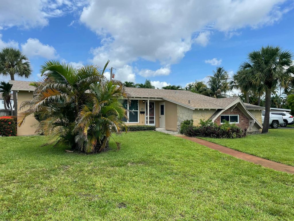 Photo of 701 Westwind Drive, North Palm Beach, FL 33408 (MLS # B26036061)