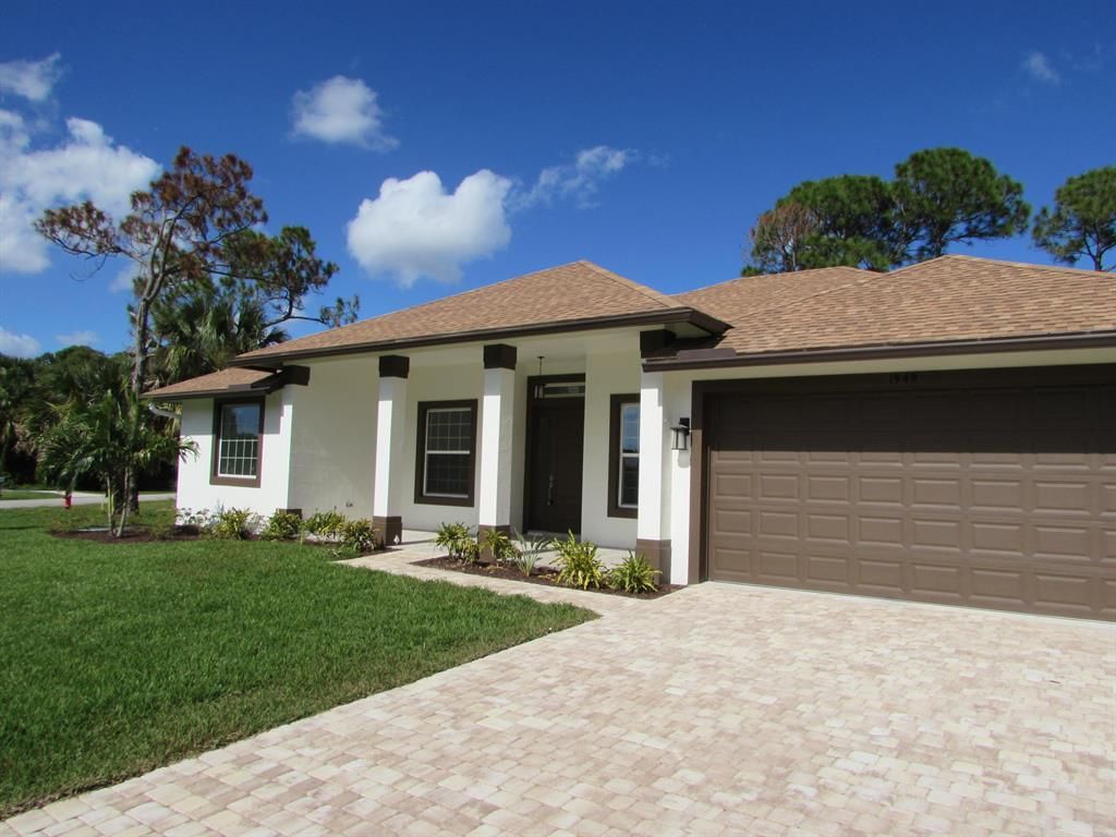 Photo of 1949 SW Lawn Lane, Port Saint Lucie, FL 34953 (MLS # R10717684)