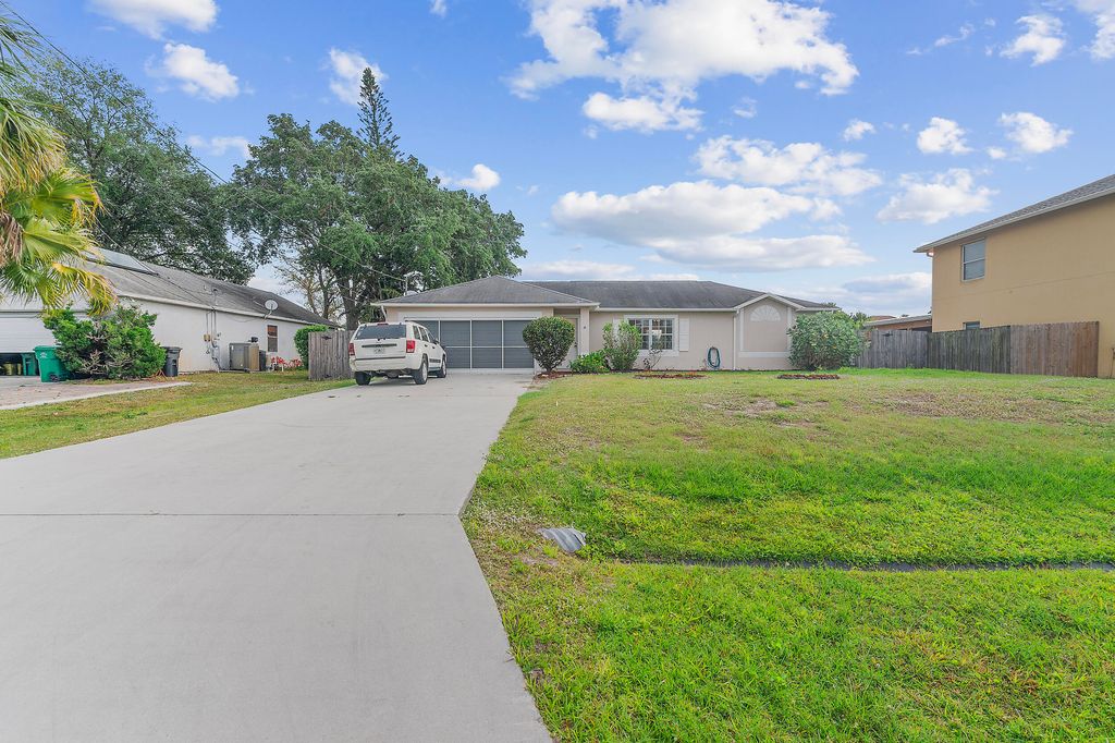 Photo of 3749 SW Kasin Street, Port Saint Lucie, FL 34953 (MLS # R11070639)