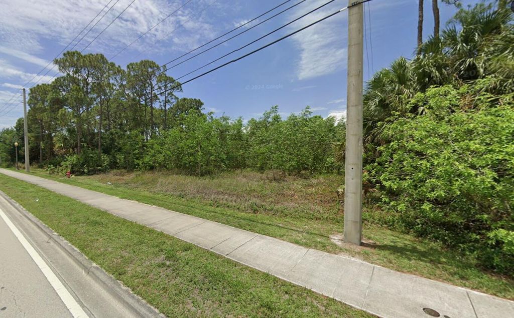 Photo of 325 NW Prima Vista Boulevard, Port Saint Lucie, FL 34983 (MLS # B26025775)