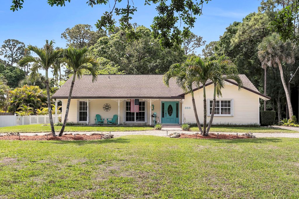 Photo of 355 S 86th Ter S, West Palm Beach, FL 33411 (MLS # B26008324)