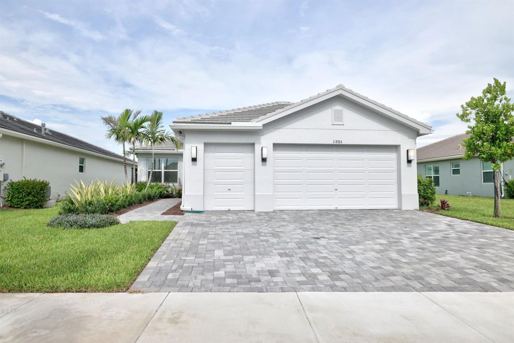 Photo of 11886 SW Poseidon Way, Port Saint Lucie, FL 34987 (MLS # R10994188)