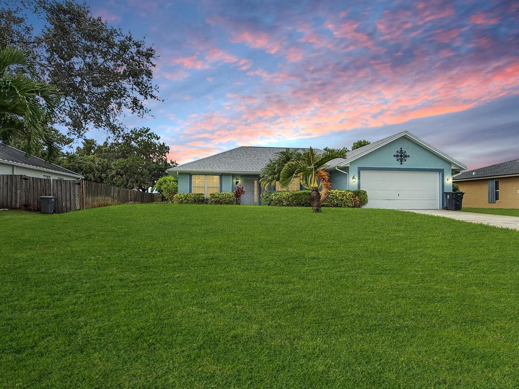 Photo of 2348 SW Pamona Street, Port Saint Lucie, FL 34953 (MLS # R11110759)