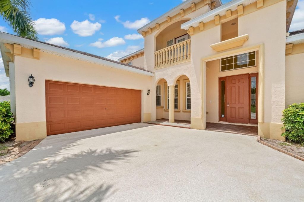 Photo of 841 SW Haas Avenue, Port Saint Lucie, FL 34953 (MLS # F10516840)