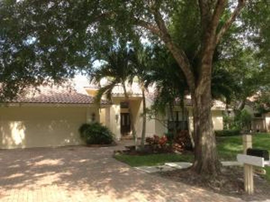 Welcome to this great home in the Shores. Rutenberg built CBS 3BR plus den/2.5 bath pool home situated on the lake with stunning views. Desirable split floor plan,formal LR & DR features a decorative fireplace make its statement as you enter. Large family room has cathedral ceiling, bamboo floor and glass at ceiling peak providing more natural light into this room as well as the kitchen/breakfast area. Large covered screened patio and pool area for all your entertaining needs or just your own relaxation with picturesque views of the lake in both directions. Come check it out for yourself...you'll want it for your own.