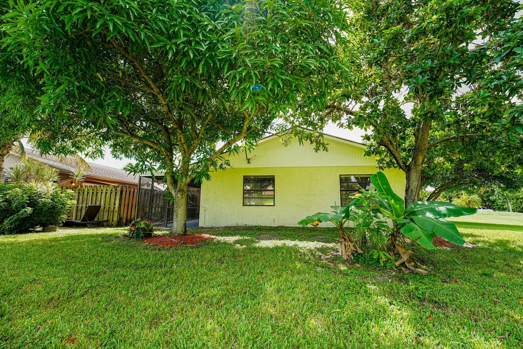 Photo of 4971 Palm Hill Drive, West Palm Beach, FL 33415 (MLS # B26087512)