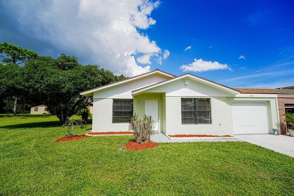Photo of 4971 Palm Hill Drive, West Palm Beach, FL 33415 (MLS # B26087512)