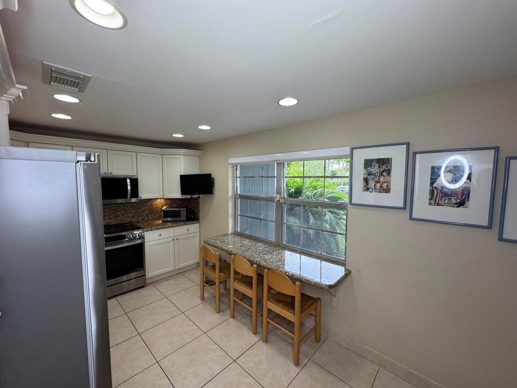 Photo of 625 Oaks Drive #106, Pompano Beach, FL 33069 (MLS # B26003838)