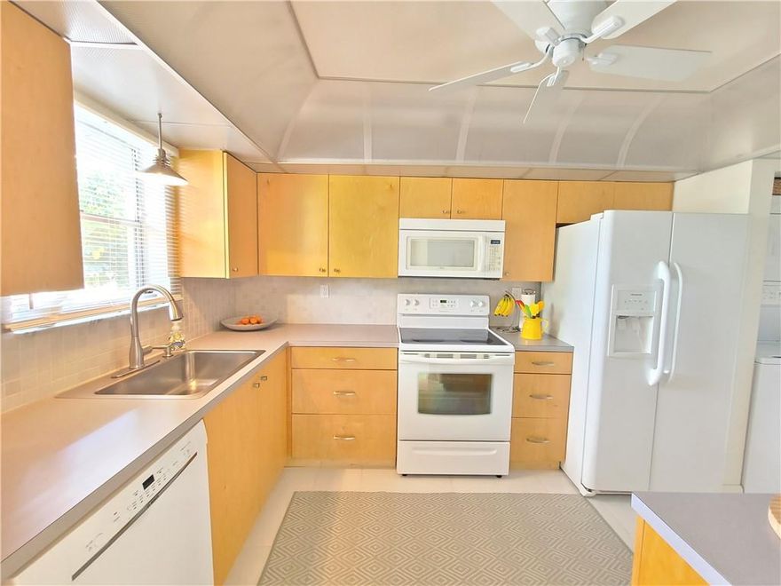 Charming updated 2 bedrooms, 2 bathrooms condo. Bright unit with lots of natural light. Tile flooring and carpet in 1 bedroom. 2 updated bathrooms w/ walk-in showers. Spacious master bedroom w/ 2 walk-in closets. Fully furnished ready to move in. A/C 2015. Water heater 2022. Updated kitchen with wood cabinets. Lots of cabinets for extra storage. Washer & dryer in the unit. Enjoy a relaxing tropical garden view and walking paths from your spacious private screened in patio. HOA fees including cable and internet. Well maintained building with reserve funds. New roof 2020. 55+ 24/7 gated community. Clubhouse, heated pool, BBQ are. Exercise room. & more. Great location minutes to shopping & restaurants. Welcome home!! NO PICK-UP TRUCK OR MOTOCYCLE.