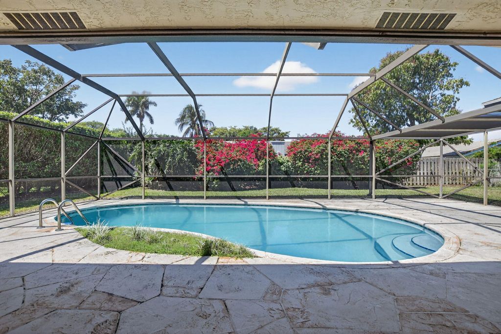 Photo of 3069 NW 27th Avenue, Boca Raton, FL 33434 (MLS # B26005054)