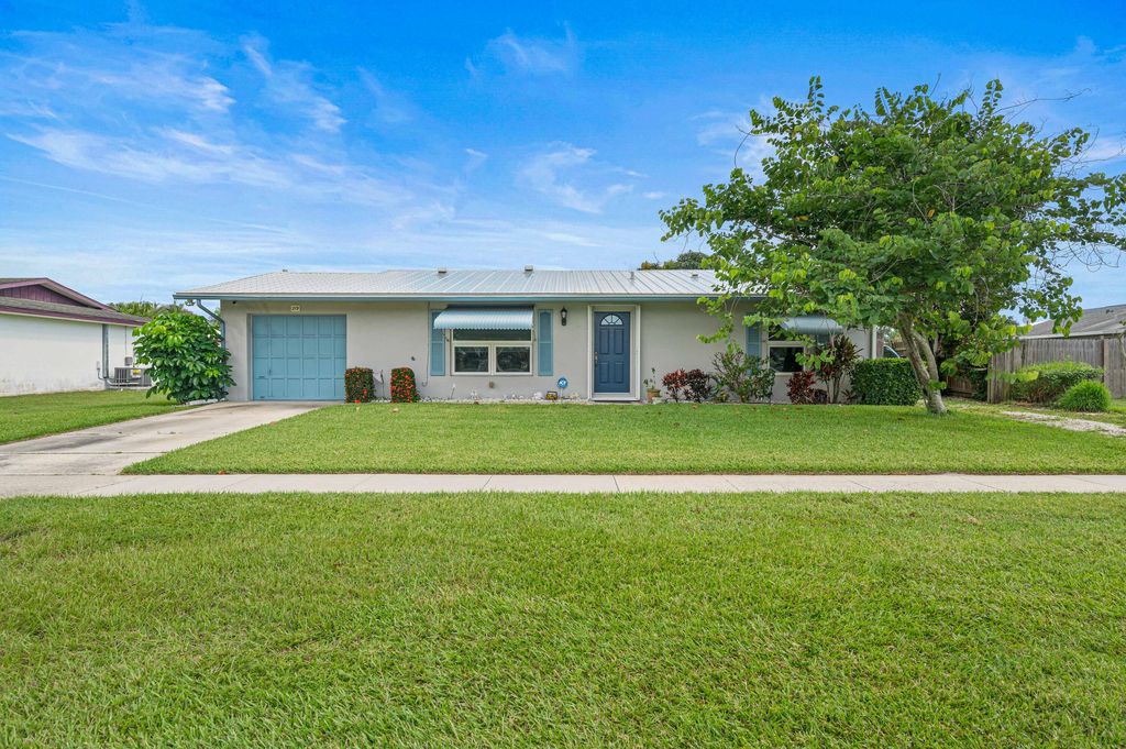 Photo of 219 NE Floresta Drive Dr, Port Saint Lucie, FL 34983 (MLS # R10814402)