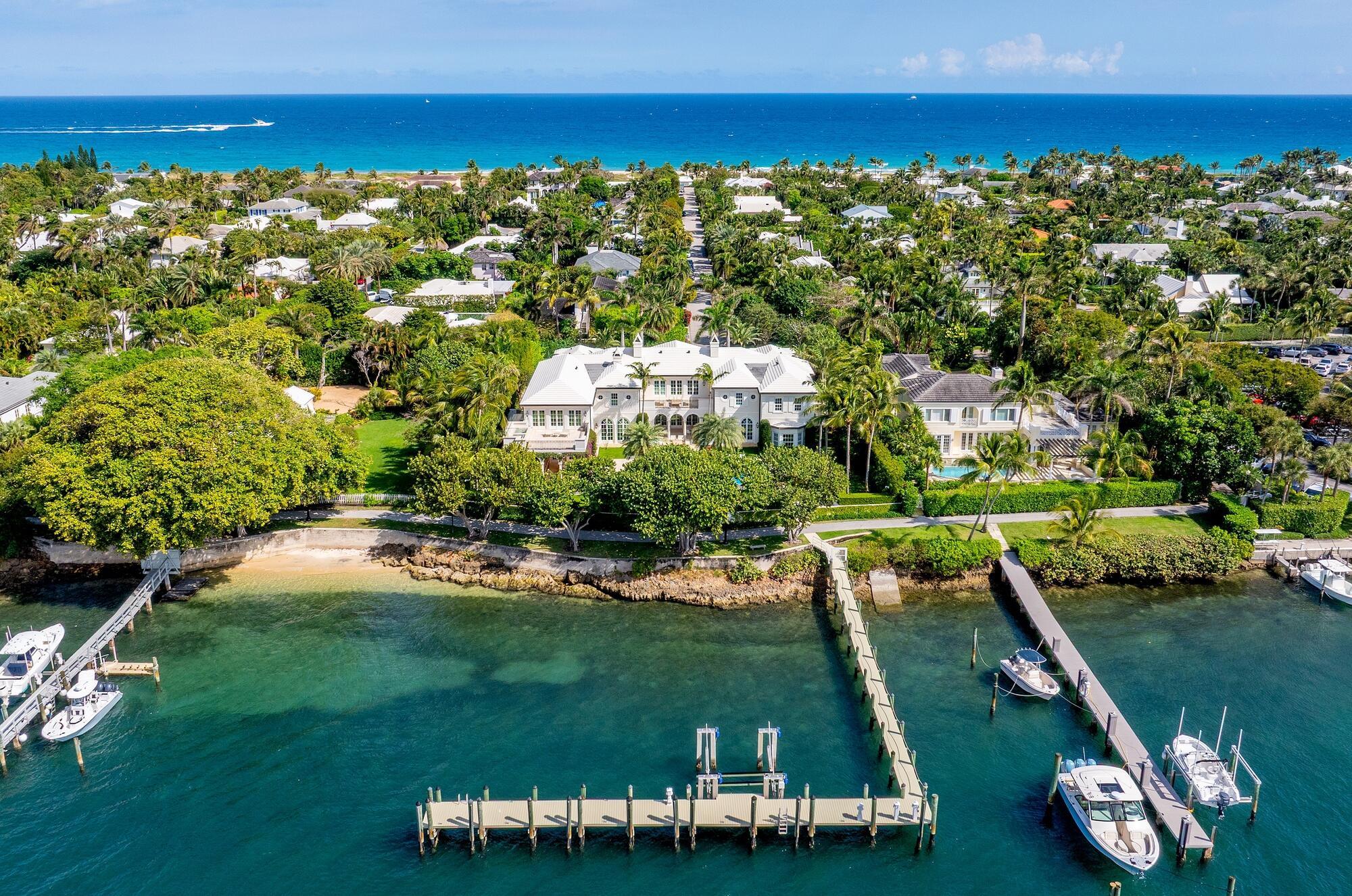 Pristine and rarely available Intracoastal front estate located in Palm Beach's serene North End. Highlights include 7BR/9.3BA, 150+/- feet of Intracoastal frontage, deep-water dock with boat lift, and over 17,000 total square feet. This rare and luxurious home boasts breathtaking lake and sunset views from all principal rooms. Gorgeous Island Colonial with stunning stone and hardwood flooring, high ceilings, and great natural light. First and second floor Primary Suites with dual baths and closets. Formal living room with fireplace and French doors leading to covered loggia. Stunning library with built-ins, formal dining room with butler's pantry, and light-filled family room. Eat-in entertaining kitchen and professional chef's kitchen both equipped with top-of-the-line appliances. The