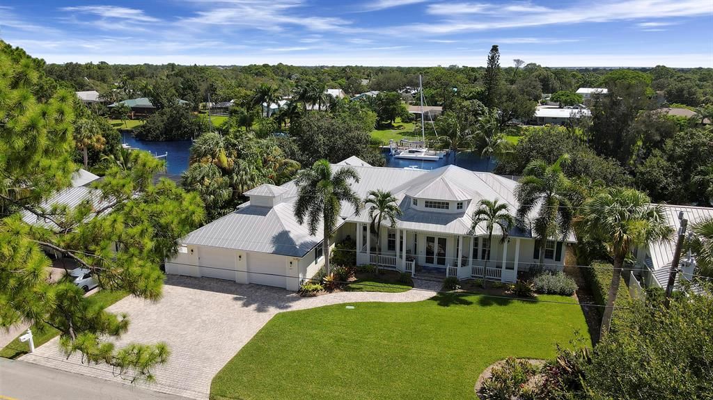 Photo of 851 SW Pine Tree Lane, Palm City, FL 34990 (MLS # R10739818)