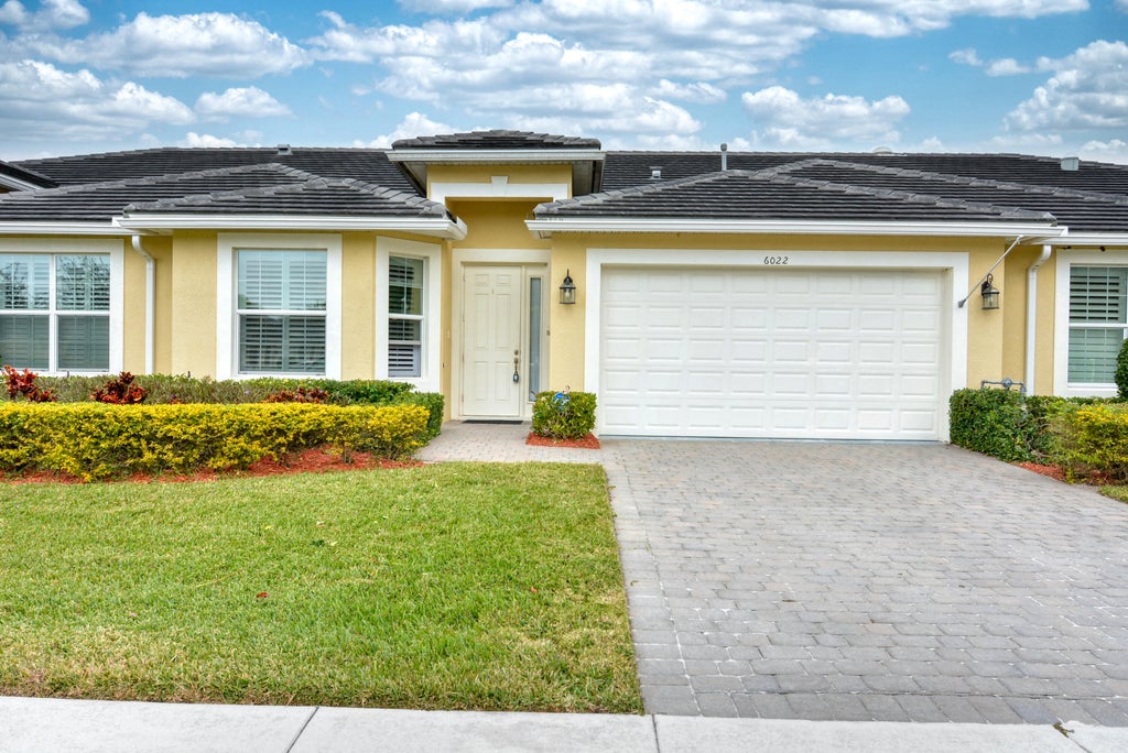 Photo of 6022 NW Cullen Way, Port Saint Lucie, FL 34983 (MLS # R11052532)