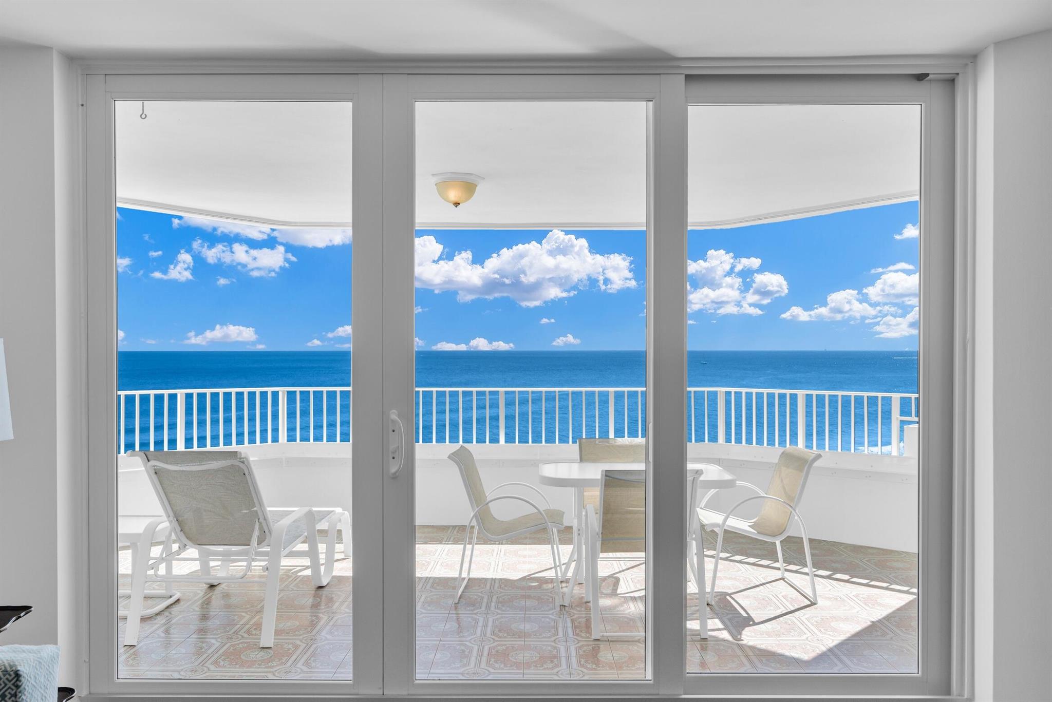 Highly sought-after mid-floor unit with ideal south/southeast exposure and a split floor plan--perfect for a winter retreat. Enjoy breathtaking, unobstructed ocean views from the moment you walk in. The kitchen and bathrooms feature elegant cabinetry and granite countertops, while the living area and guest room showcase high-quality parquet flooring. Impact-resistant doors and windows provide added peace of mind. Experience premier oceanfront living with a stunning lobby, cutting-edge fitness center, and resort-style pool. Other amenities include a ping pong room, two tennis/pickleball courts, an oceanfront BBQ area, and a separate BBQ pavilion along the Intracoastal. Everything you need is right here!