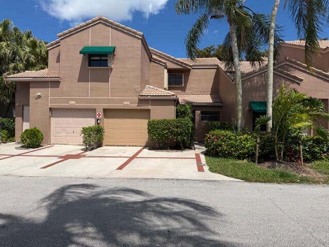 Photo of 1622 Cypress Pointe Drive #4-11, Coral Springs, FL 33071 (MLS # B26037868)