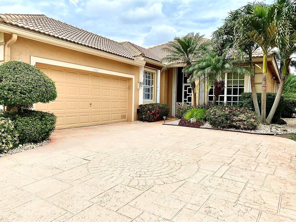 Photo of 7587 Doubleton Drive, Delray Beach, FL 33446 (MLS # R10882305)
