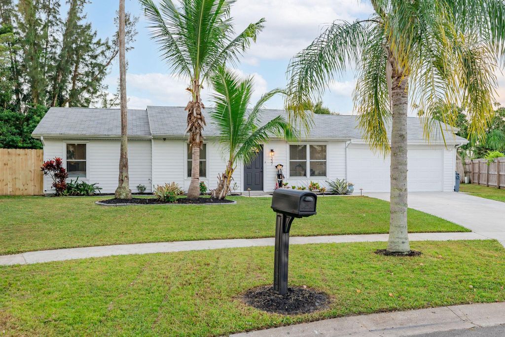 Photo of 337 NE Camelot Drive, Port Saint Lucie, FL 34983 (MLS # R10931963)