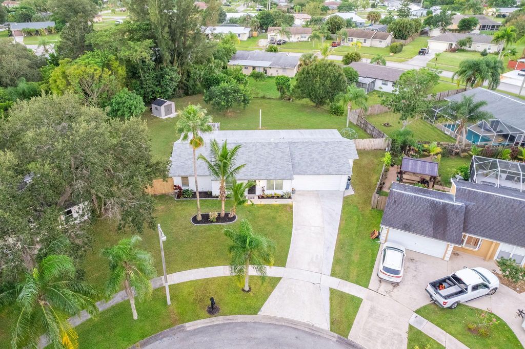 Photo of 337 NE Camelot Drive, Port Saint Lucie, FL 34983 (MLS # R10931963)