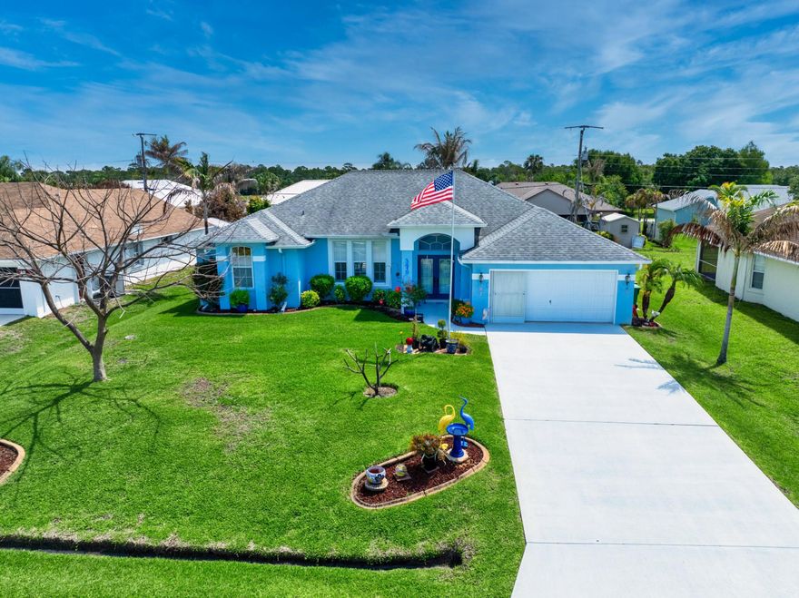 Welcome to this stunning 3-bedroom, 2.5-bath pool home offering just under 1,900 square feet of beautifully designed living space with exceptional curb appeal and lush landscaping. From the moment you arrive, the grand double entry doors set the tone for the elegance and functionality found throughout the home. Inside, you'll find a spacious open-concept layout where the living, dining, and kitchen areas flow seamlessly together, creating the perfect setting for everyday living and entertaining. The upgraded kitchen features granite countertops, stainless steel appliances, and gorgeous cabinetry that truly stands out. In addition to the main living space, the home also offers a more formal second living and dining area, providing versatility for gatherings or quiet relaxation.  One of the most impressive features of this home is how nearly every major living area is designed around the heated saltwater pool and screened lanai. Multiple access doors from throughout the home create an incredible indoor-outdoor lifestyle, making the pool area the true heart of the property. Whether hosting guests or enjoying a peaceful evening at home, the expansive lanai and resort-style pool area provide the perfect backdrop for entertaining and relaxation. The oversized primary suite is a private retreat featuring French doors leading directly to the pool area, dual walk-in closets, and a spacious ensuite bath with dual sinks, a soaking tub, and separate shower. The split-bedroom floor plan offers privacy for guests with two generously sized guest bedrooms connected by a full bathroom. A dedicated under-air cabana bath adds convenience and functionality for poolside living. Additional highlights include plantation shutters throughout the home, a storage shed in the backyard, and meticulously maintained landscaping that enhances the property's beautiful setting. This home perfectly combines comfort, style, and an exceptional entertaining-focused design centered around the stunning pool and outdoor living spaces.