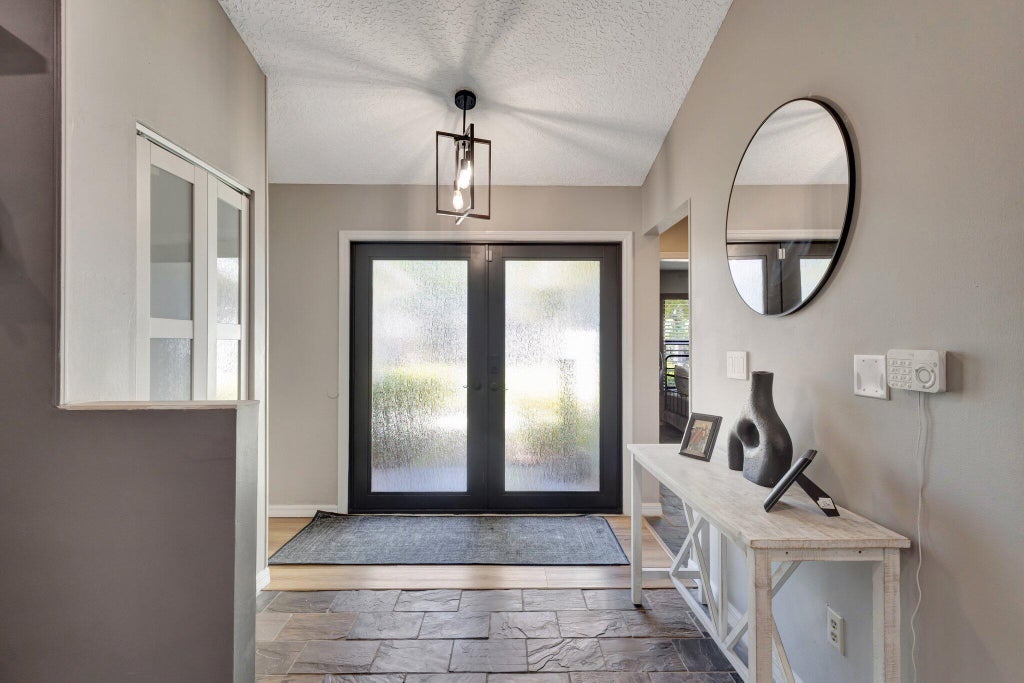 Photo of 13005 MEADOWBREEZE Drive, Wellington, FL 33414 (MLS # B26093142)