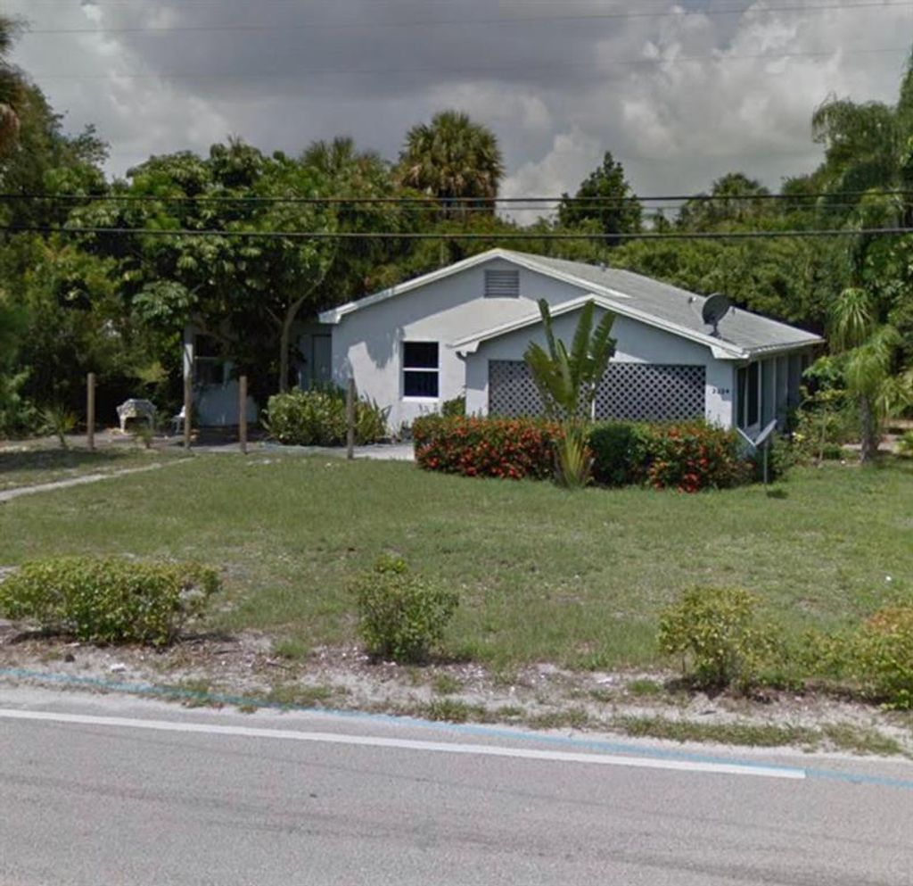 Photo of 2324 NE Indian River Drive, Jensen Beach, FL 34957 (MLS # R10718869)